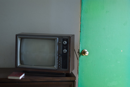 old tv with open door @ chinook motel